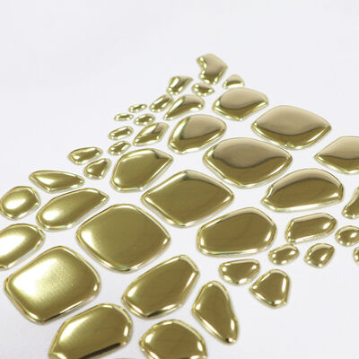 Fabrica Custom Metallic Gold TPU Heat Transfer Label - Emblema de Forma Irregular para Vestuário de Luxo e Vestuário de Moda