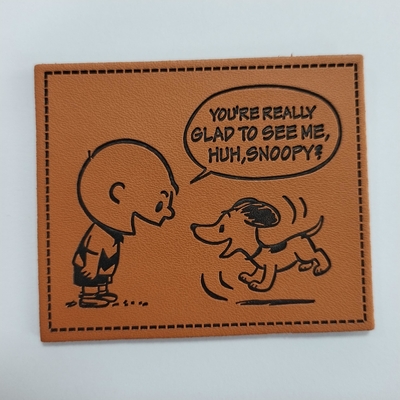 O plutônio gravou/a etiqueta de couro remendo do metal personalizada para o vestuário da roupa