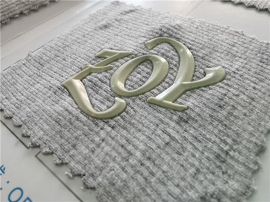 A roupa lavável da transferência térmica do crachá 3D Tagless etiqueta o material do silicone