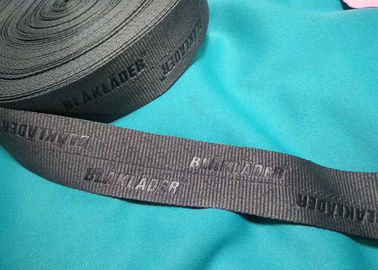 O poliéster 100%/nylon feito malha dobrou a fita elástica com logotipo gravada