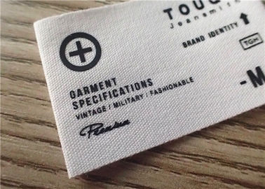 Etiquetas tecidas algodão da roupa com logotipo branco do gráfico do fundo e da impressão