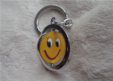 Presentes relativos à promoção personalizados da cor porta-chaves de prata com a cara amarela de sorriso Rotatable