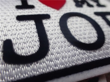 A roupa feita sob encomenda elegante remenda o logotipo que do slogan EU AMO MEU luxuoso do TRABALHO que se reune cromàtica