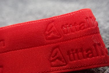 Faixa tecida Sportswear gravada vermelho