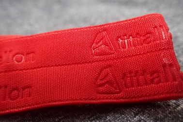 Faixa tecida Sportswear gravada vermelho