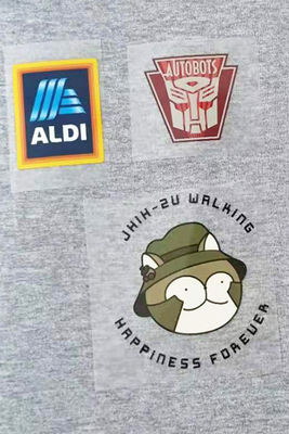 A transferência térmica feita sob encomenda da etiqueta remenda aplicações que do vinil DIY Appliques a imprensa térmica na roupa