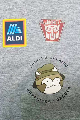 A transferência térmica feita sob encomenda da etiqueta remenda aplicações que do vinil DIY Appliques a imprensa térmica na roupa