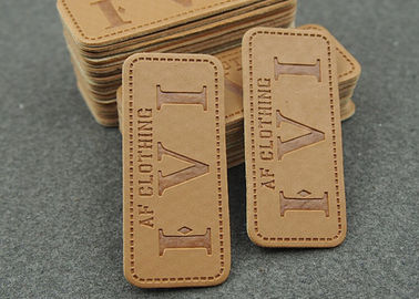 A roupa feita sob encomenda durável remenda os remendos de couro para o logotipo das calças de brim imprimível