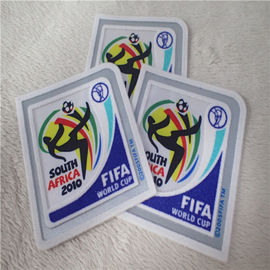Transferência térmica do campeonato do mundo de FIFA que reune os remendos multi - cor para a decoração do Sportswear